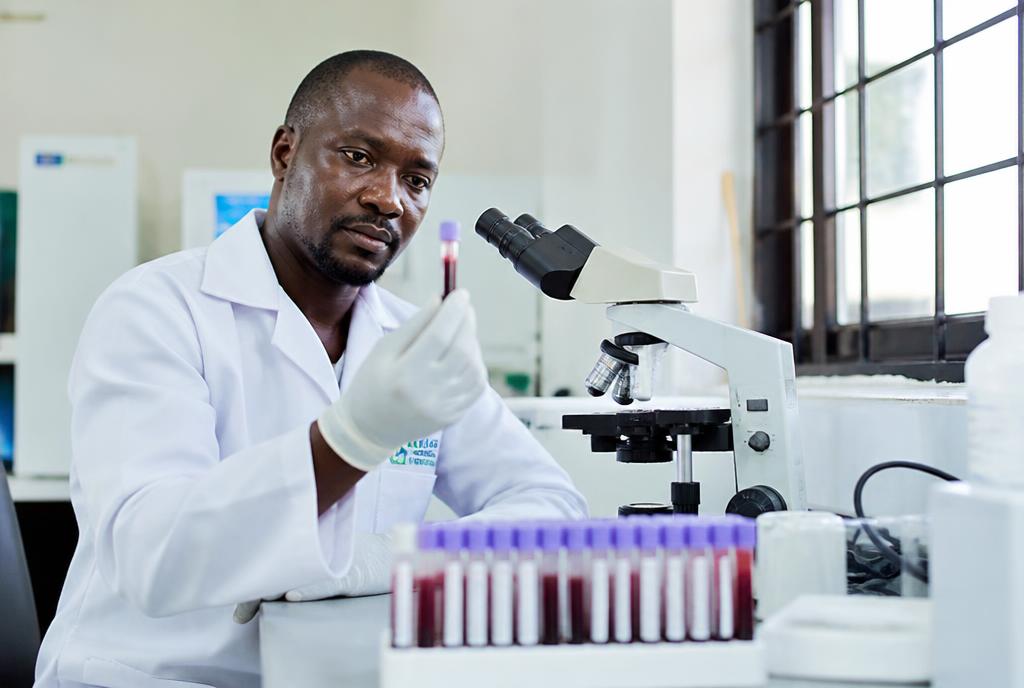 Laboratory technologist analysing blood samples at Tana Wellness Centre